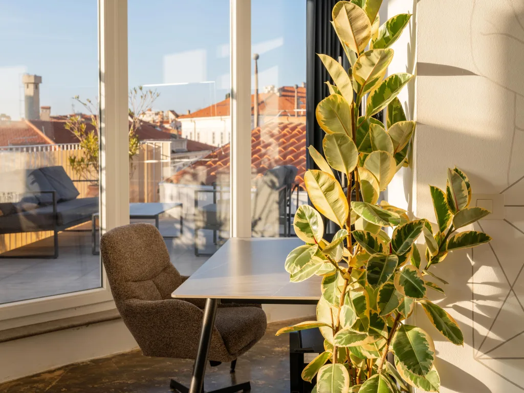 Table set on the hotel terrace above the rooftops of Piran